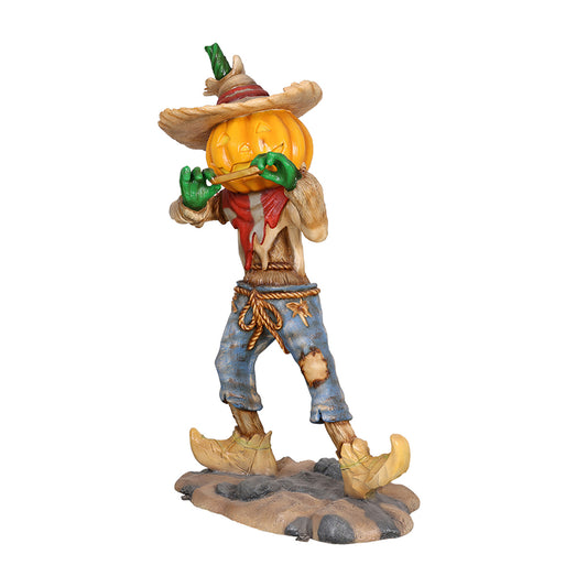 Pumpkin Scarecrow Playing Harmonica