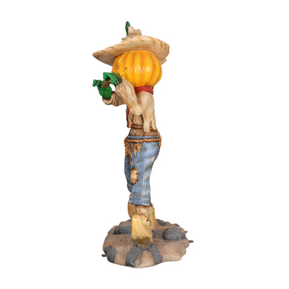 Pumpkin Scarecrow Playing Harmonica