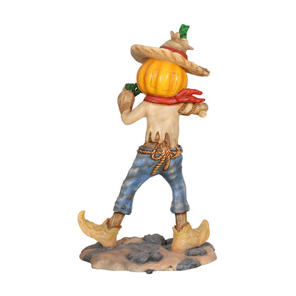 Pumpkin Scarecrow Playing Harmonica
