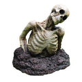 Skeleton Zombie Coming out of the Ground with Tilted Head