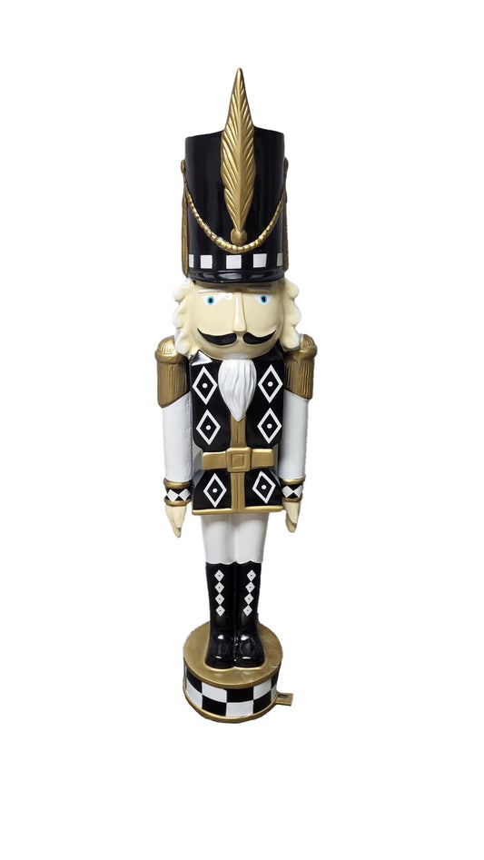 2.5' Nutcracker Wearing a Black Jacket and White Uniform