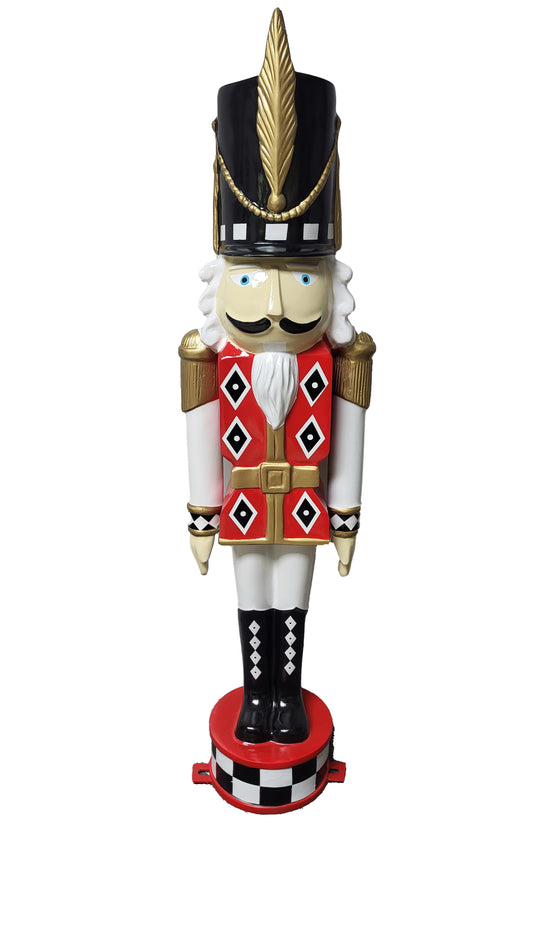 2.5' Nutcracker Wearing a Red Jacket and White Uniform